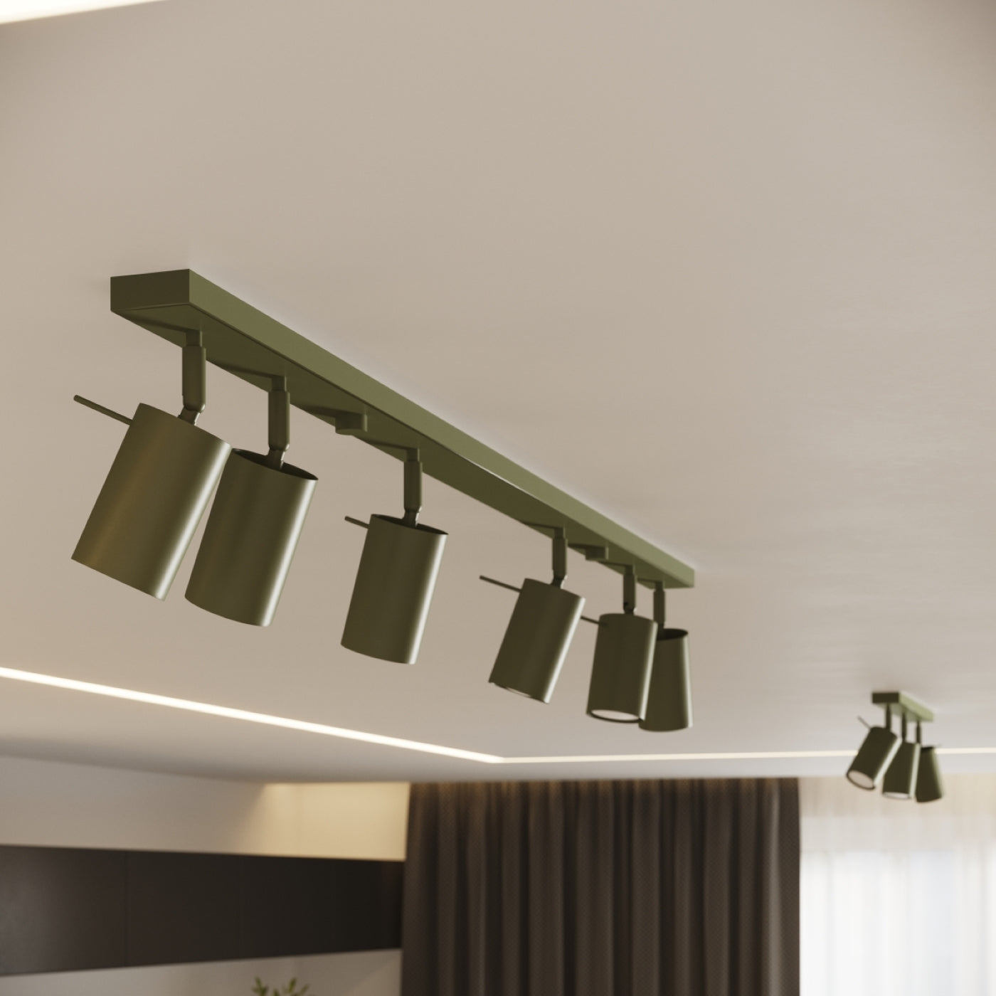 Dunkelolivgrüne Deckenleuchte mit sechs verstellbaren zylindrischen Strahlern in einem modernen Wohnraum