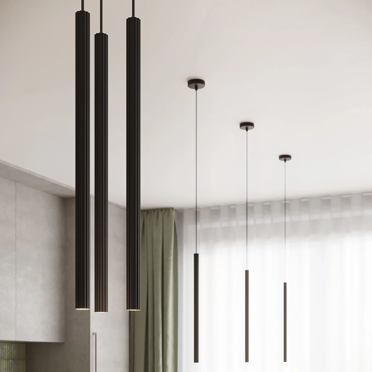 Pendelleuchte CORA 3P in Schwarz – Nahaufnahme der eleganten Zylinderformen in modernem Interieur